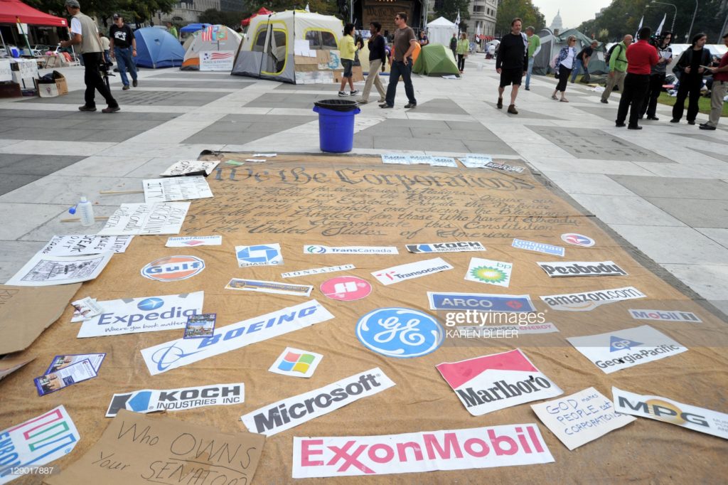 The U.S. Constitution for corporations and pass-through entities, Occupy D.C. Camp, Freedom Plaza, Washington, D.C., Tuesday, 10 October 2011. (Photographer Karen Bleier / AFP via Getty Images.)