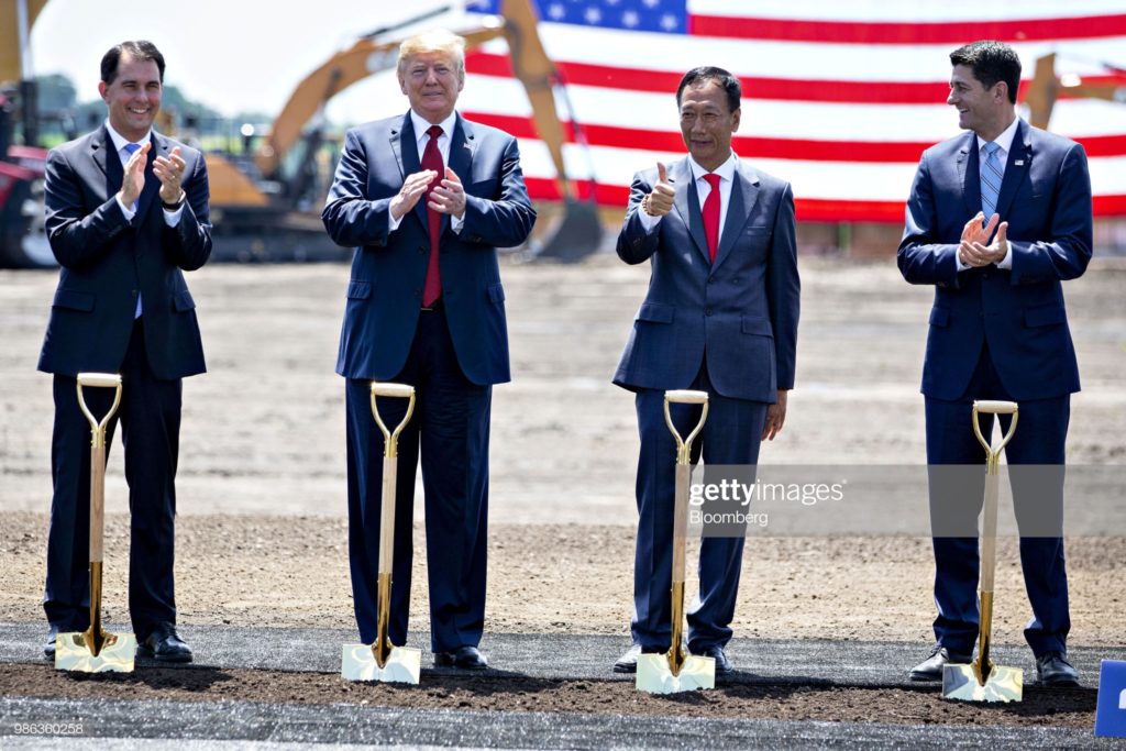 From left to right: Former Governor of Wisconsin, Scott Walker; Donald John Trump, of Trump University; Chairman of Foxconn Technology Group, Terry Gou; former Speaker of the House of Representatives, Paul Ryan, Mount Pleasant, Wisconsin, Thursday, 28 June 2018. (Photographer Daniel Acker / Bloomberg via Getty Images.)