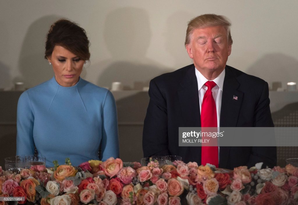 From right to left:  Donald John Trump, of Trump University, and Melania Trump, third wife of Donald John Trump, of Trump University, Inaugural Luncheon, U.S. Capitol Building, Washington, D.C., Friday, 20 January 2017. (Photographer Molly Riley / AFP via Getty Images.)